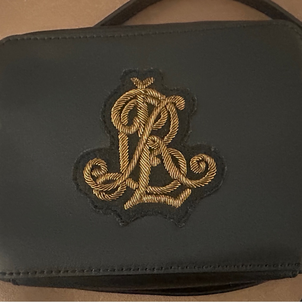 Polo Ralph Lauren mini crossbody with beautiful P/R/L embroidered emblem.